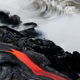 Illustration for article titled Extremely dangerous lava surf photography is completely worth the risk